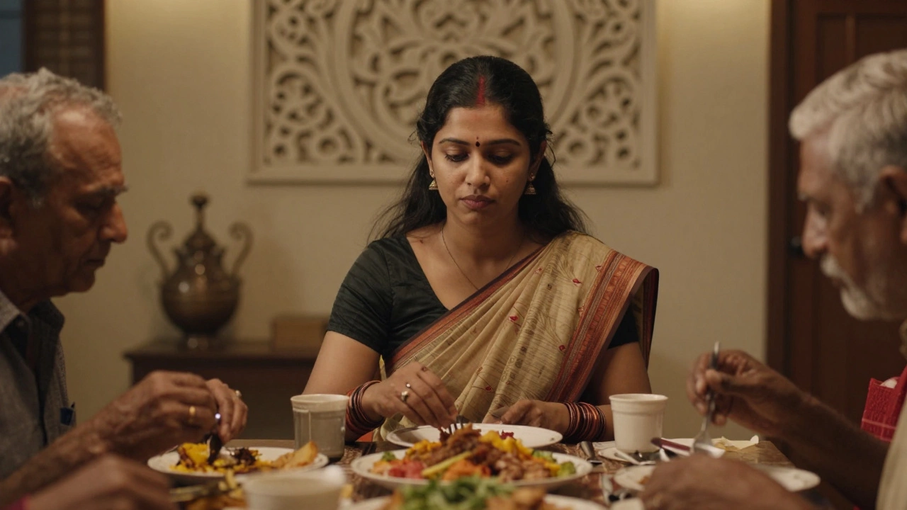 An Indian woman sitting silently at dinner, refusing to eat as family rules govern her actions.
