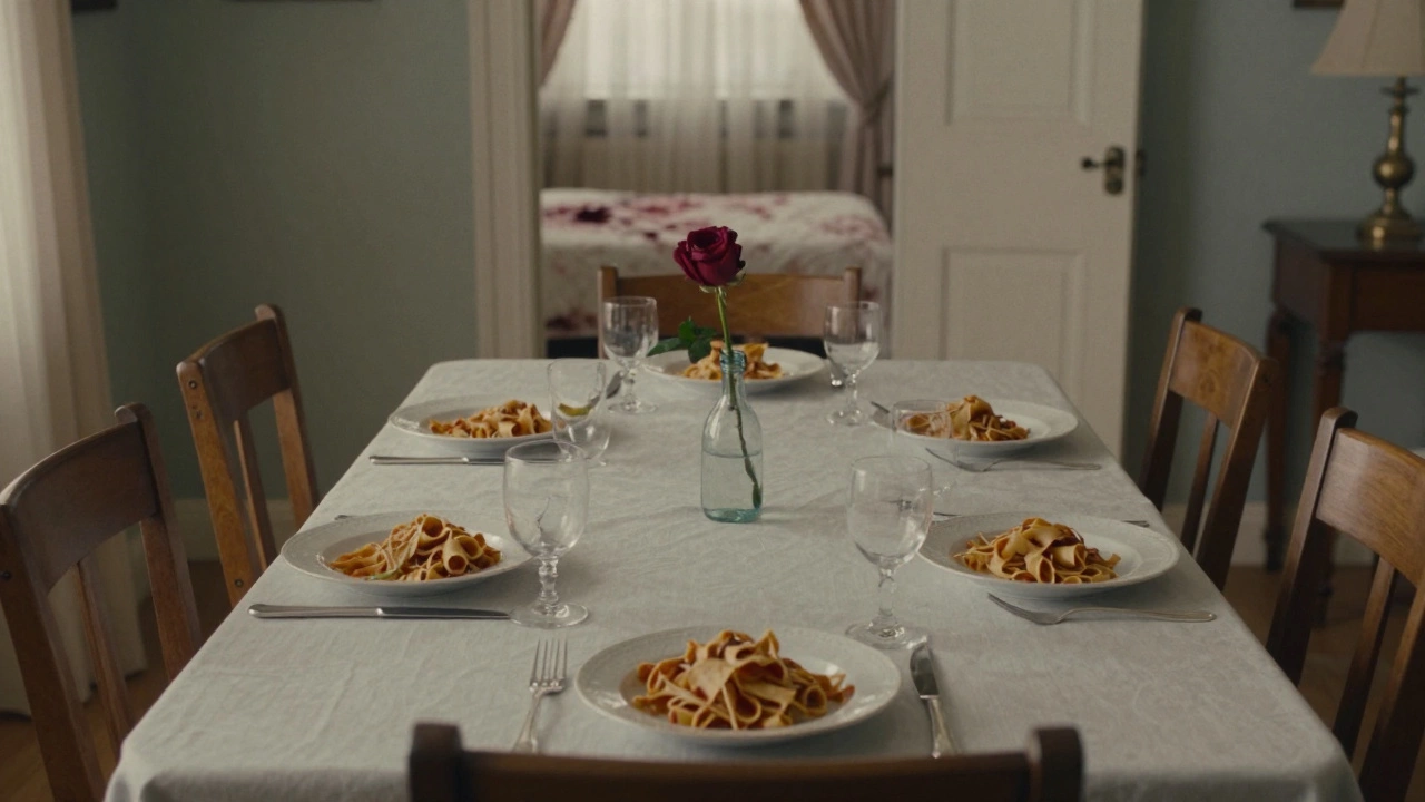 An abandoned family dinner table with a bloodstained sheet glimpsed in the background.